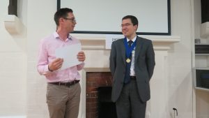 Terry presenting Florian a gift from the club